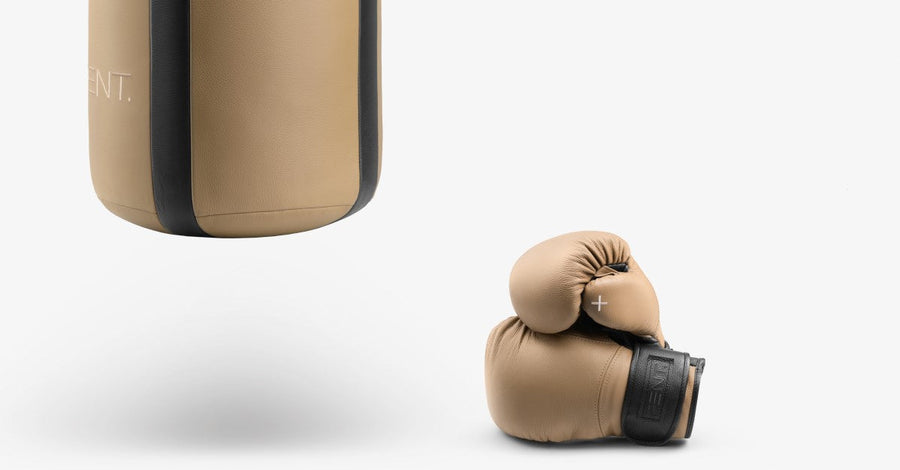 pent RAXA™ Handcrafted Punching Gloves. Introducing our luxurious boxing equipment collection, featuring meticulously handcrafted punching gloves. 